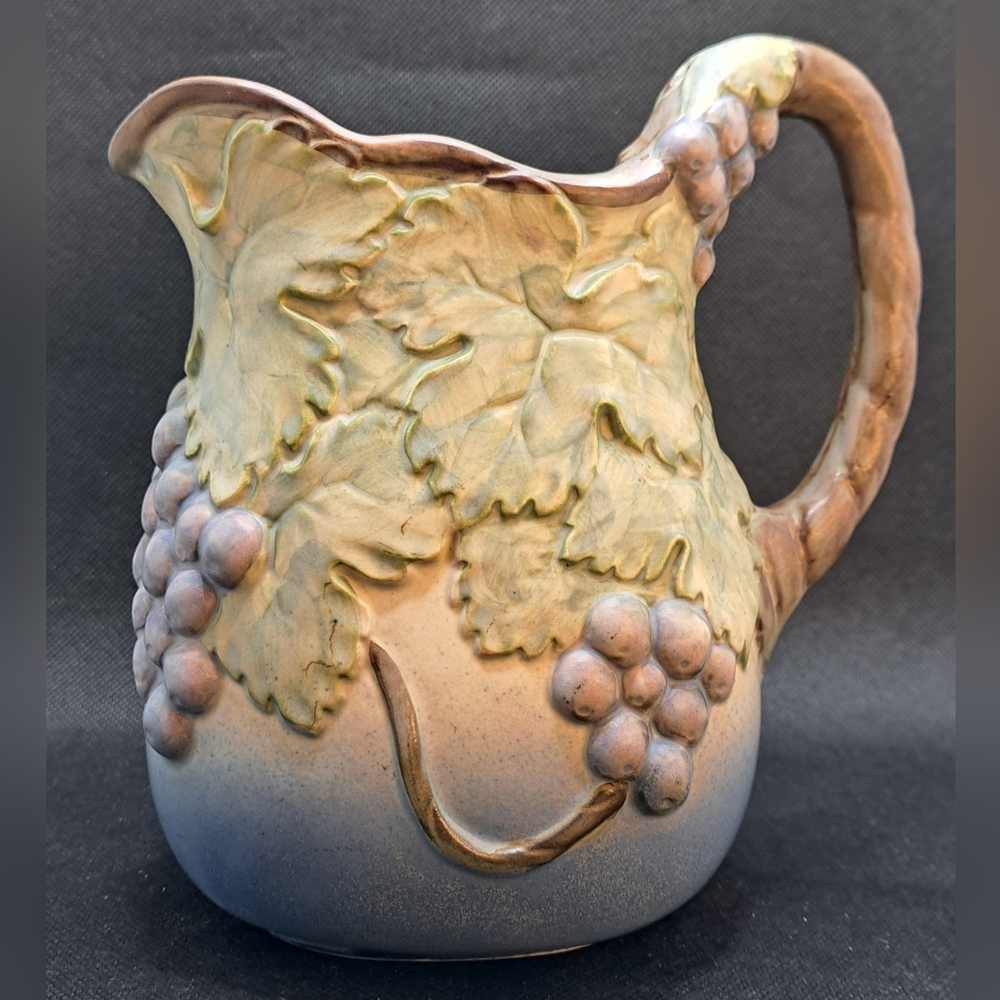 Beautiful vintage majolica pitcher with grapes and leaves 3d Relief